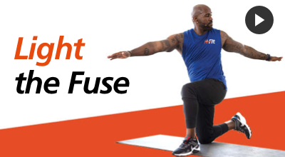 Video still of Dolvett Quince for H-Fit workout Light the Fuse.