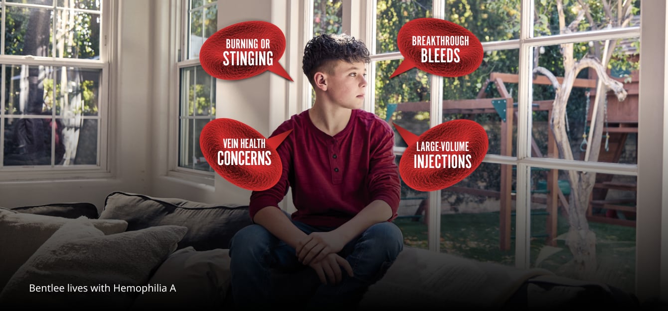 person seated near a window, looking out