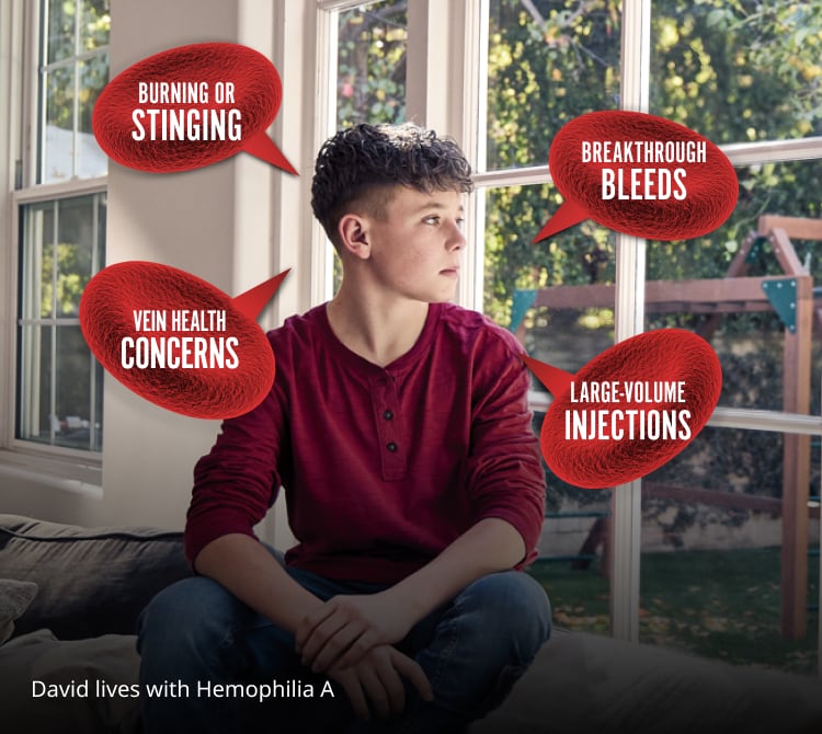 person seated near a window, looking out