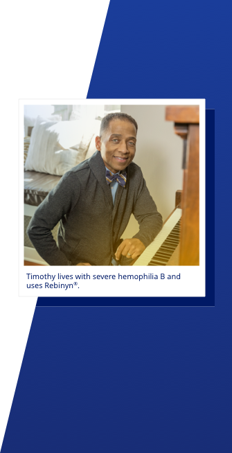 A man named Timothy sits at the piano and smiles.